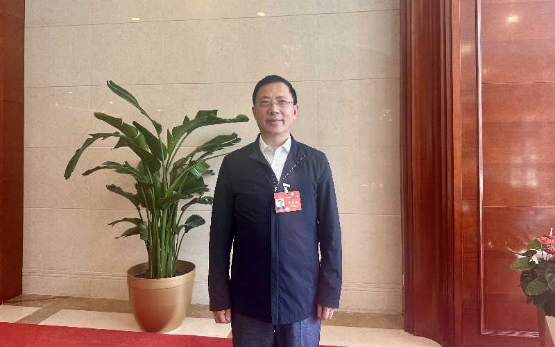 全國政協(xié)委員、武漢理工大學(xué)黨委書記信思金。人民網(wǎng)記者 張沛攝